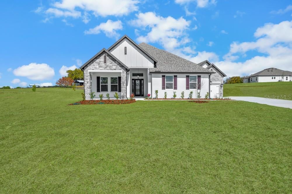 Photo of 3845 Saddle Hill Trail, Fruitland Park, FL 34731 (MLS # TB8535585)