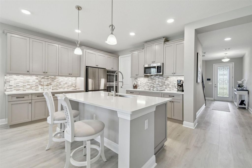 Photo of 33287 Sycamore Leaf Drive, Wesley Chapel, FL 33545 (MLS # TB8391233)