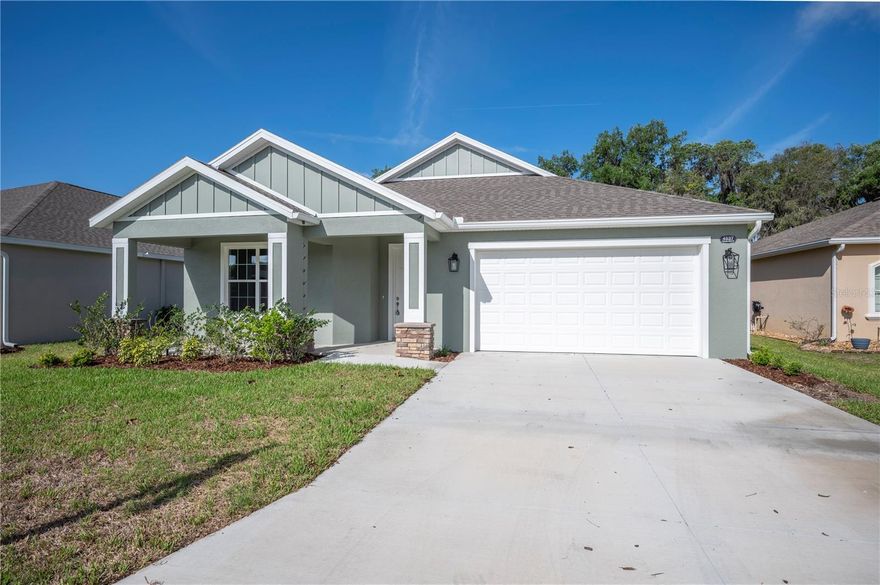 **Builder is offering a $10,000 credit to buy down your interest rate or put towards closing costs! Welcome to this beautifully crafted 4 bedroom, 2.5 bathroom home located at 4545 Fairway Oaks Dr. This 2025 home is nestled within a desirable gated community in Mulberry, offering peaceful water views, open living spaces, and everyday convenience. Built by a quality builder known for lasting craftsmanship, this home blends thoughtful design with a prime location.

Step inside to discover a bright, open floor plan designed for both comfortable living and effortless entertaining. The spacious layout flows beautifully, creating inviting areas for gathering while still offering privacy where it matters most. The attention to detail is visible in all the small details. The Great room features luxury vinyl plank flooring with tray ceilings, Upgraded quartzite counters throughout the home, upgraded doors throughout, ceiling fans already installed. Throughout the home, you’ll appreciate upgraded details such as soft-close cabinetry and under-cabinet lighting, adding both style and convenience to the kitchen and living areas.

The primary suite is a true retreat, featuring zero entry shower, dual sinks, dual walk-in closets, private toilet closet, all providing both function and luxury. 

Enjoy tranquil mornings and relaxing evenings on the covered porch overlooking the water, perfect for unwinding or hosting guests. The home is also equipped with an irrigation system on a timer, helping keep the lawn lush and maintenance simple. 

Conveniently located with easy access to County Line Road, South Florida Avenue, and Highway 60, commuting and daily errands are a breeze. You’re also within a short drive to I-4, as well as both downtown Lakeland and downtown Mulberry for dining, shopping, and local events.

This home offers the perfect combination of quality construction, modern upgrades, scenic surroundings, and a location that keeps you connected to everything Central Florida has to offer. Don’t miss this opportunity — schedule your private showing today or share this listing with your agent before it’s gone! **Click on the virtual tour button for a Matterport 360 degree immersive walkthrough tour of the home. Just like a 24/7 open house!