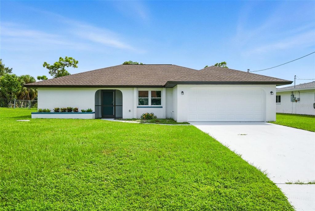 Photo of 22381 Nyack Avenue, Port Charlotte, FL 33952 (MLS # TB8422494)