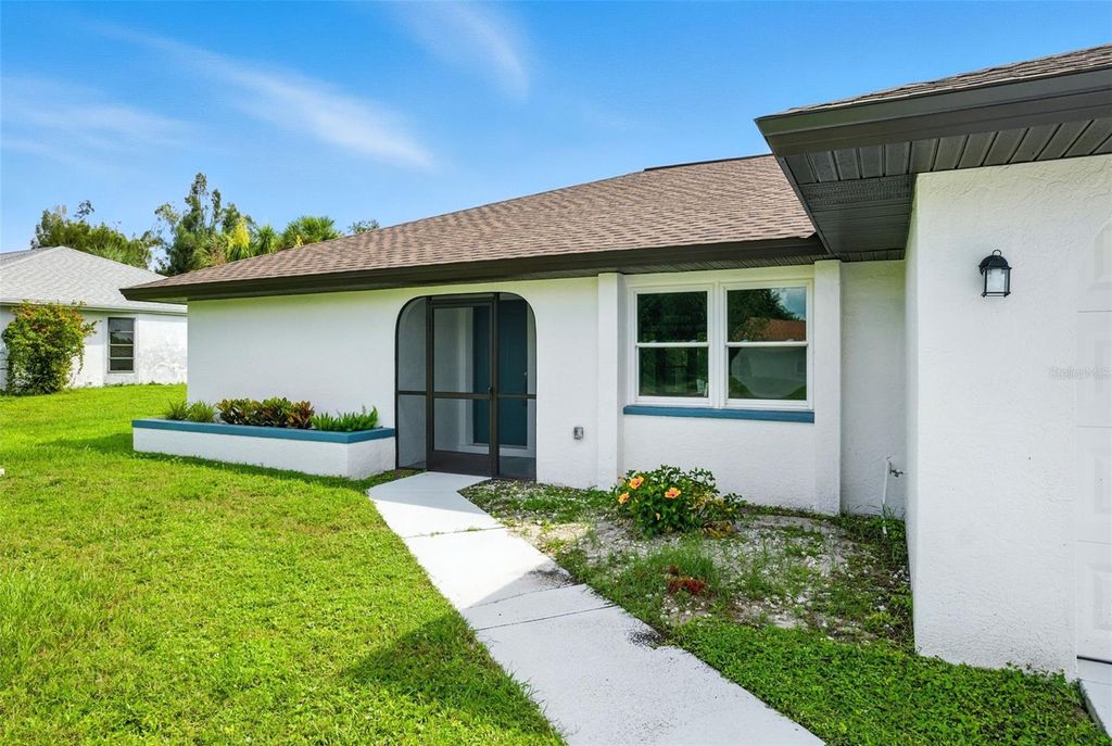 Photo of 22381 Nyack Avenue, Port Charlotte, FL 33952 (MLS # TB8422494)