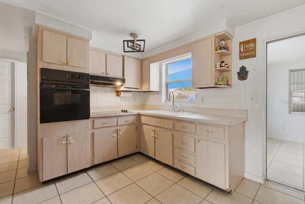 Photo of 4808 Bonton Drive, Holiday, FL 34690 (MLS # W7886315)