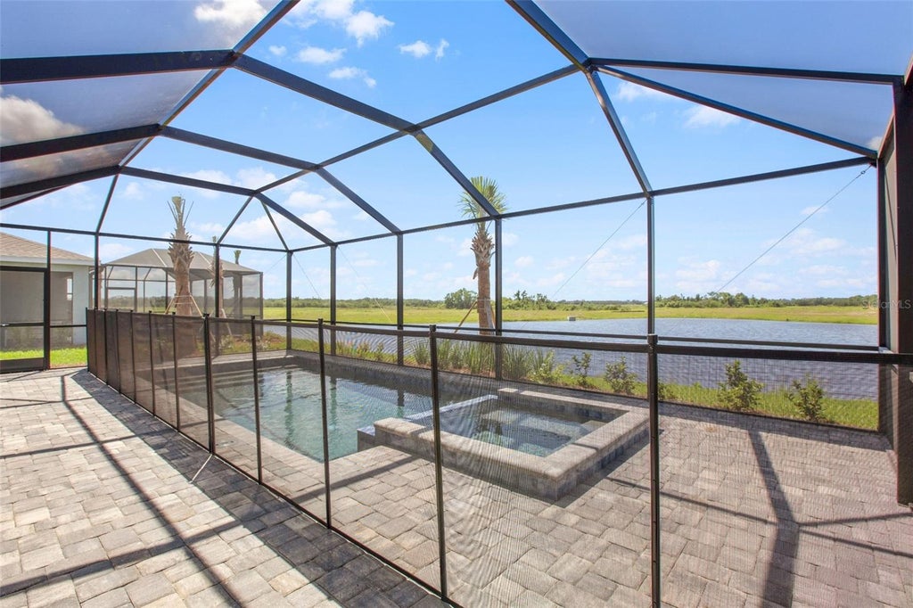 Photo of 17722 Haden Cove, Parrish, FL 34219 (MLS # A4710389)