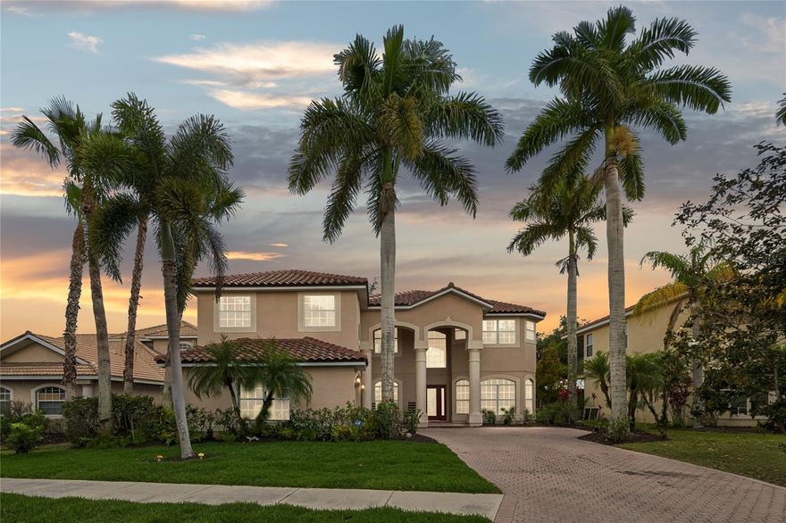 Waterfront elegance awaits in the gated community of River Place on the beautiful Braden River. Designed for entertaining, this spacious home features a grand foyer with soaring ceilings, formal living and dining rooms, and a private first-floor bedroom with its own bath. The main level features diagonal tile flooring, a large family room with a built-in entertainment center and dry bar, and a beautifully appointed kitchen with staggered cabinetry, a center island, breakfast bar, bay windows, and stainless-steel appliances. Upstairs offers four additional bedrooms, a loft, a bonus/media room, and a luxurious primary suite with double tray ceilings, a spa-style bath, walk-in closets, and access to an expansive balcony with stunning river views. Enjoy Florida outdoor living with a large screened pool and spa, along with a private deeded boat dock with direct river access. Recent updates include fresh exterior paint, new carpet, a new roof, and updates to two bathrooms. Enjoy amenities with no CDD fees, including a clubhouse, fitness center, heated community pool, kayak launch, and nature trails. Schedule your private showing today!