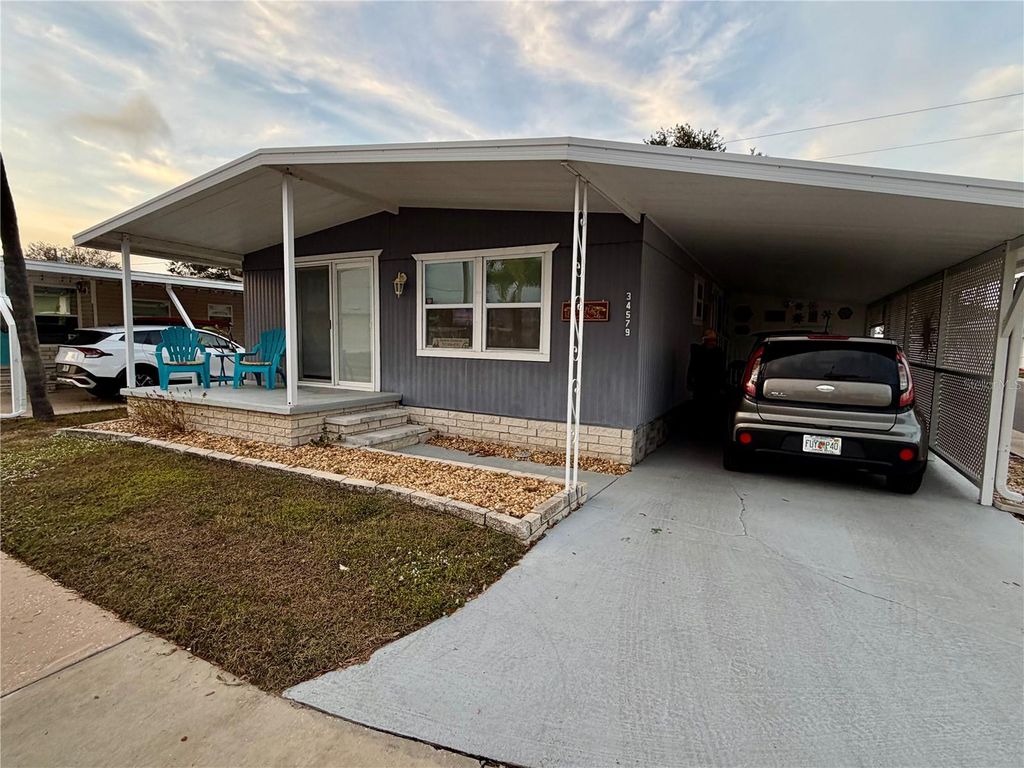 Photo of 34579 Gardenia Drive N, Pinellas Park, FL 33781 (MLS # TB8454852)