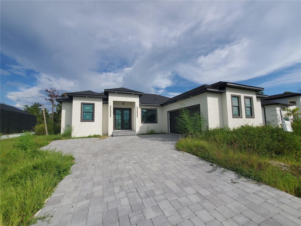 Photo of 9100 Santa Lucia Drive, Port Charlotte, FL 33981 (MLS # A4662054)