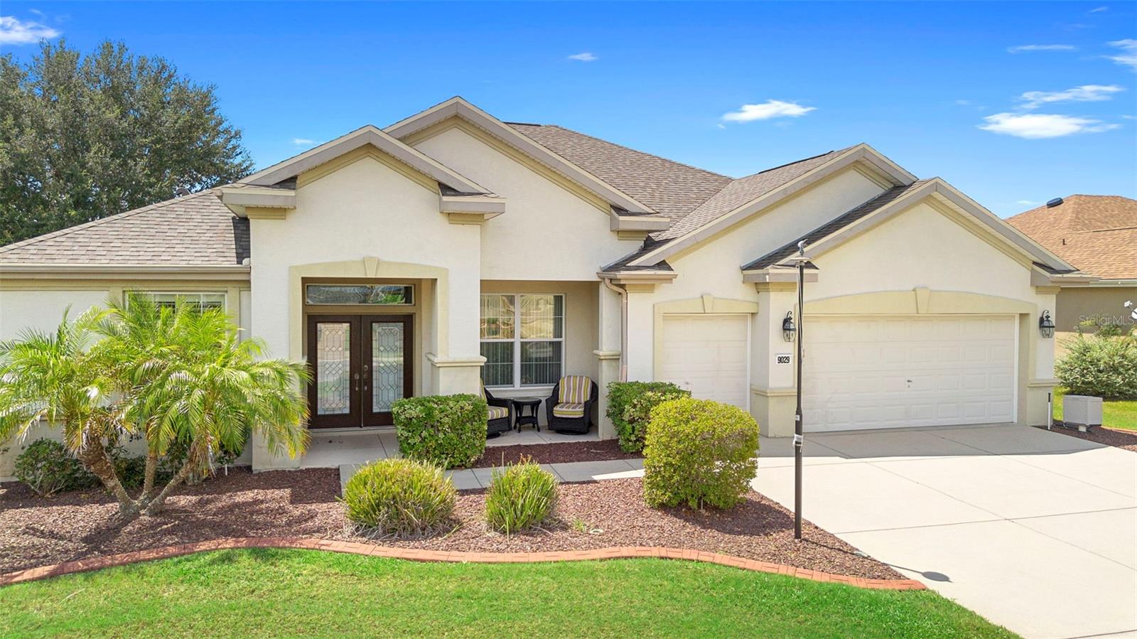 Welcome Home to the Retirement Community of Del Webb Spruce Creek Golf & Country Club! This spacious 3 Bedroom, 2 Bath home features an office with built-in shelving and desk, oversized patio and sits on a corner lot. NEW ROOF June 2023, brand new refrigerator in the kitchen. Additional space with a true split floor plan, formal dining room and formal living room. The primary bedroom has a large bathroom and walk-in closet. Mature landscaping and a golf cart garage add to the perks of resort style living. Community features golf, tennis, shuffleboard, community center, indoor pool, outdoor pool and a fitness center. Come by today and indulge in true Florida living!