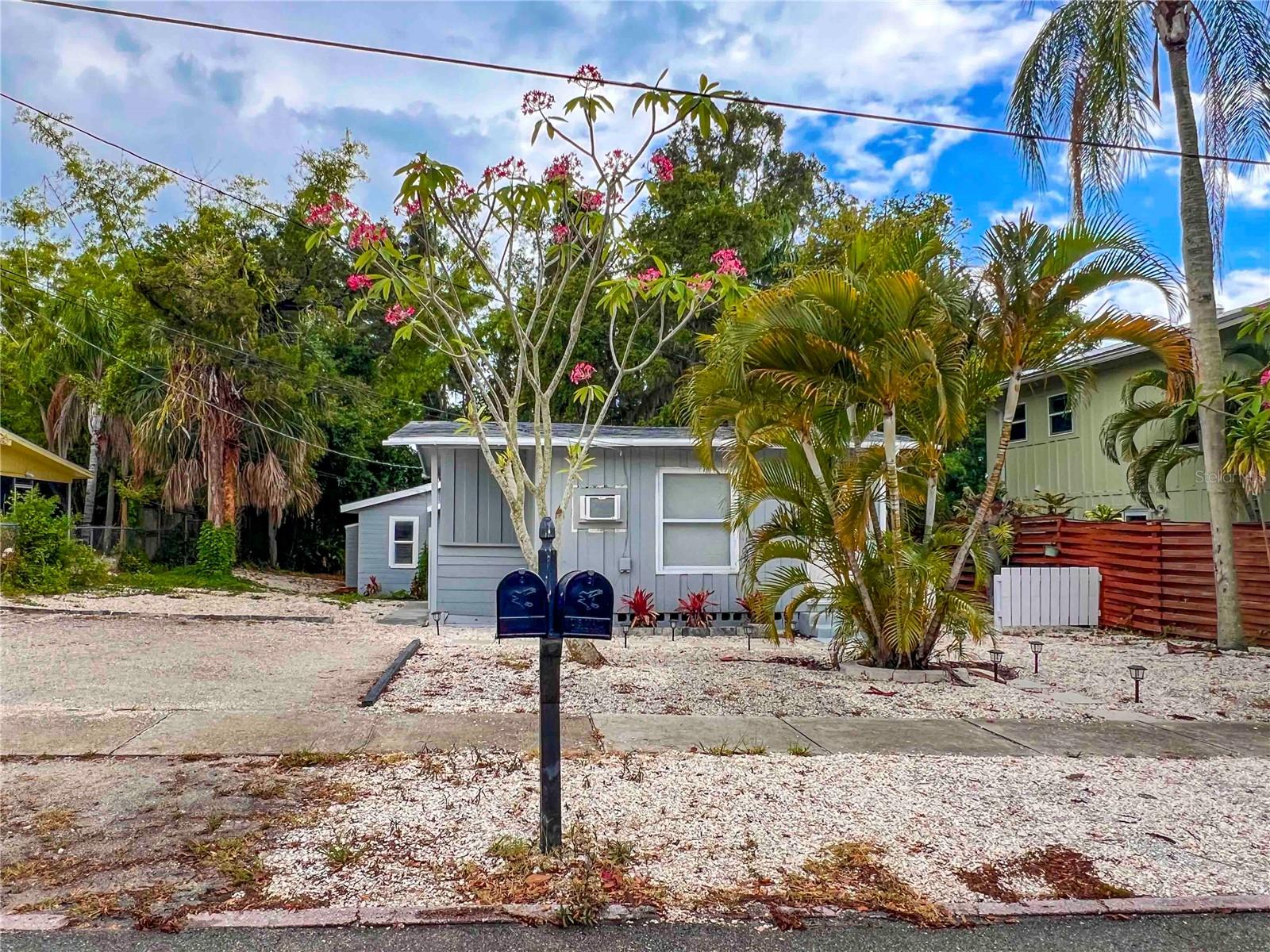 This is a 1 bedroom 1 bath cottage located West of the Trail in Sarasota! The home features an open floor plan with combined living, dining and kitchen spaces. There is updated wood grain vinyl flooring throughout the home. The kitchen has been updated with shaker style cabinets, stainless steel appliances, solid surface countertops and a tile backsplash. The bedroom has a window / wall unit and a closet. The bathroom has been updated with a new vanity and a tiled walk-in shower. There is a second cottage in the back that shares the backyard with this unit. Water and sewer are included in the rent! There are no washer/dryer hookups in the home. This home is located part way down on a dead-end street. It is centrally located near US41 with quick access to Downtown Sarasota, St Armands Circle and Siesta Key. We score every application. If an application doesn’t score high enough, the resident may be required to place the equivalent of two months’ rent in a security deposit. Please be aware that leasing this property includes a non-optional Home Assistant Services Package that will cost an additional $30 per month. These services and their cost are separate from Tenant’s monthly rent payment and all other payments described in the Lease or any separate Lease addendums. The Home Assistant Services offered are described in the Resident Welcome Packet which can be viewed here: www.sarasotamanagement.com/home-assistant/