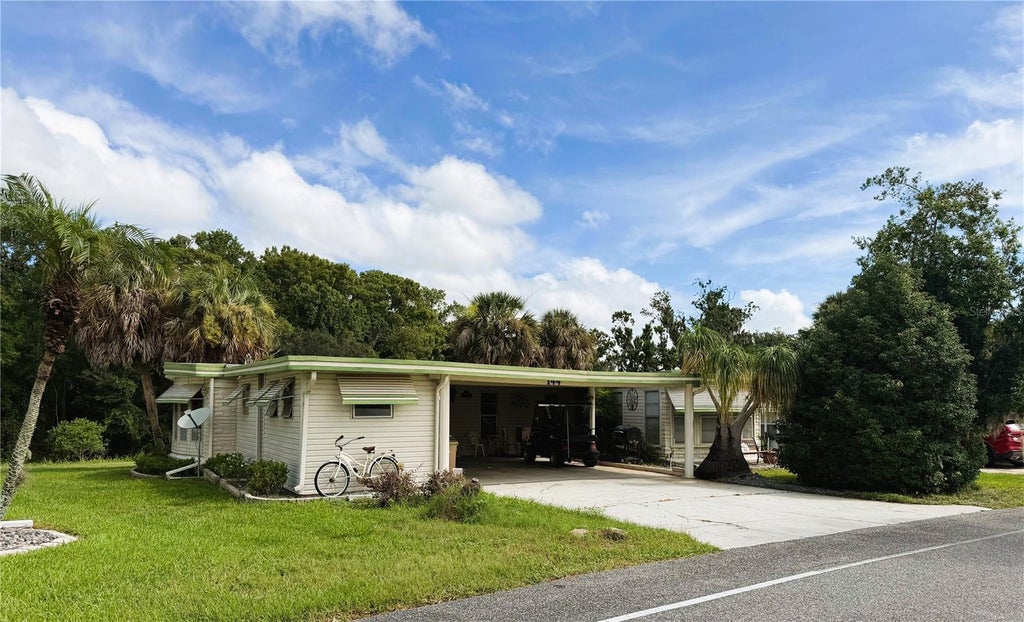Photo of 144 Palo Verde Drive, Leesburg, FL 34748 (MLS # R4911772)