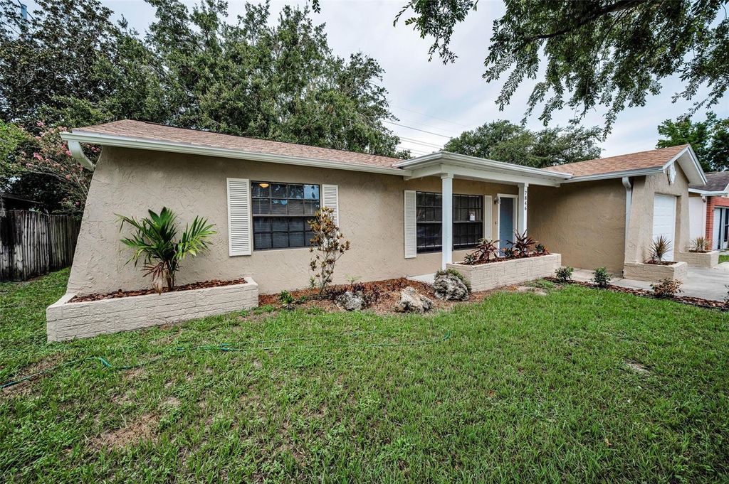 Photo of 7846 Royal Hart Drive, New Port Richey, FL 34653 (MLS # TB8408279)