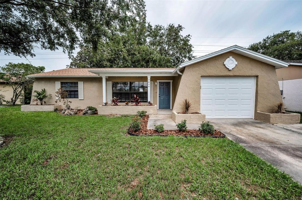 Photo of 7846 Royal Hart Drive, New Port Richey, FL 34653 (MLS # TB8408279)