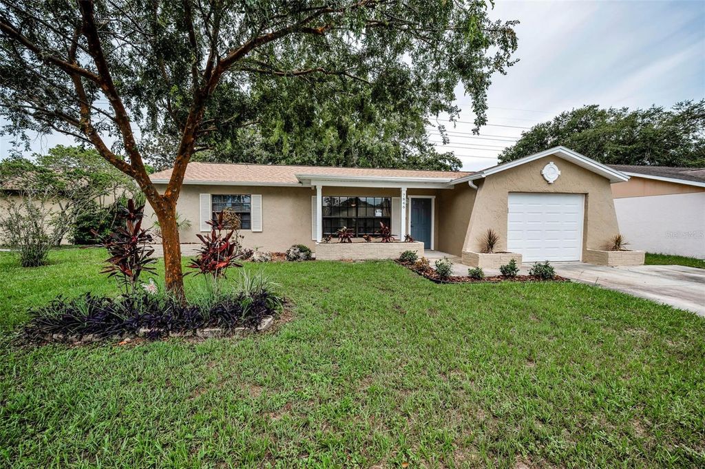 Photo of 7846 Royal Hart Drive, New Port Richey, FL 34653 (MLS # TB8408279)