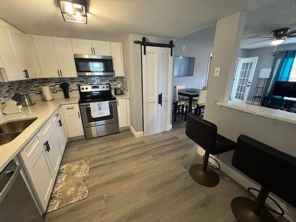 Photo of 8198 Fairways Circle #A204, Ocala, FL 34472 (MLS # O6351728)