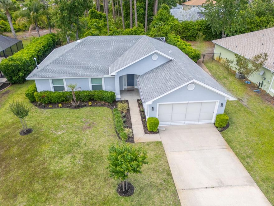 Immaculate 4-bedroom/2-bathroom home located in the highly sought-after Cypress Knoll subdivision. The Cypress Knoll Golf and Country Club is just around the corner for you golf enthusiasts! This beauty features an open-concept layout with split-plan bedrooms, offering both comfort and privacy. Wood-like plank (light gray) tile throughout for a modern touch. A dedicated indoor utility room provides added convenience and easy access. Enjoy Florida living at its finest in the screened-in back patio, perfect for relaxing or entertaining, with plenty of space to add a hot tub and create your own private oasis. Features also include:
* Fully fenced backyard * Stainless steel kitchen appliances * 4 track sliding garage door screen * Rain-bird metered well-water sprinkler system * Full house Rain Gutters * An abundance of indoor storage space * Designer primary walk-in closet space *Freshly decorated kitchen with 3cm granite counter tops and soft-close cabinets & drawers and SO MUCH MORE!!! Don't miss this exceptional value and get your slice of Palm Coast living at it's FINEST!!!