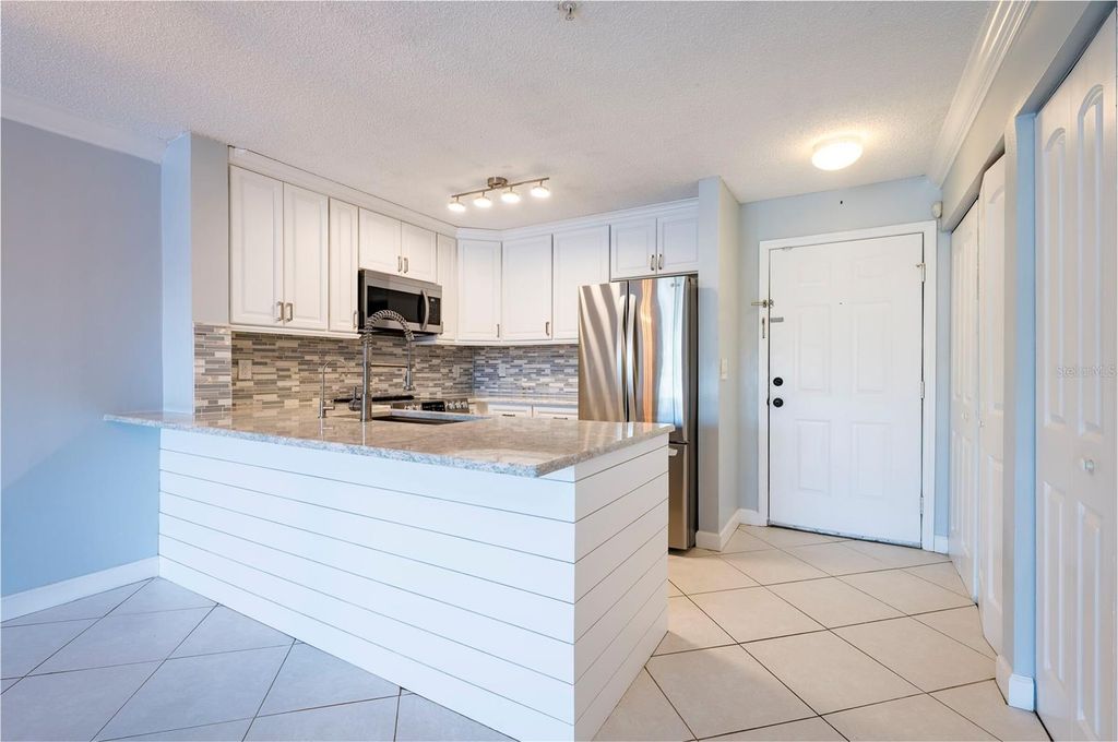Photo of 2400 Feather Sound Drive #1125, Clearwater, FL 33762 (MLS # TB8504082)