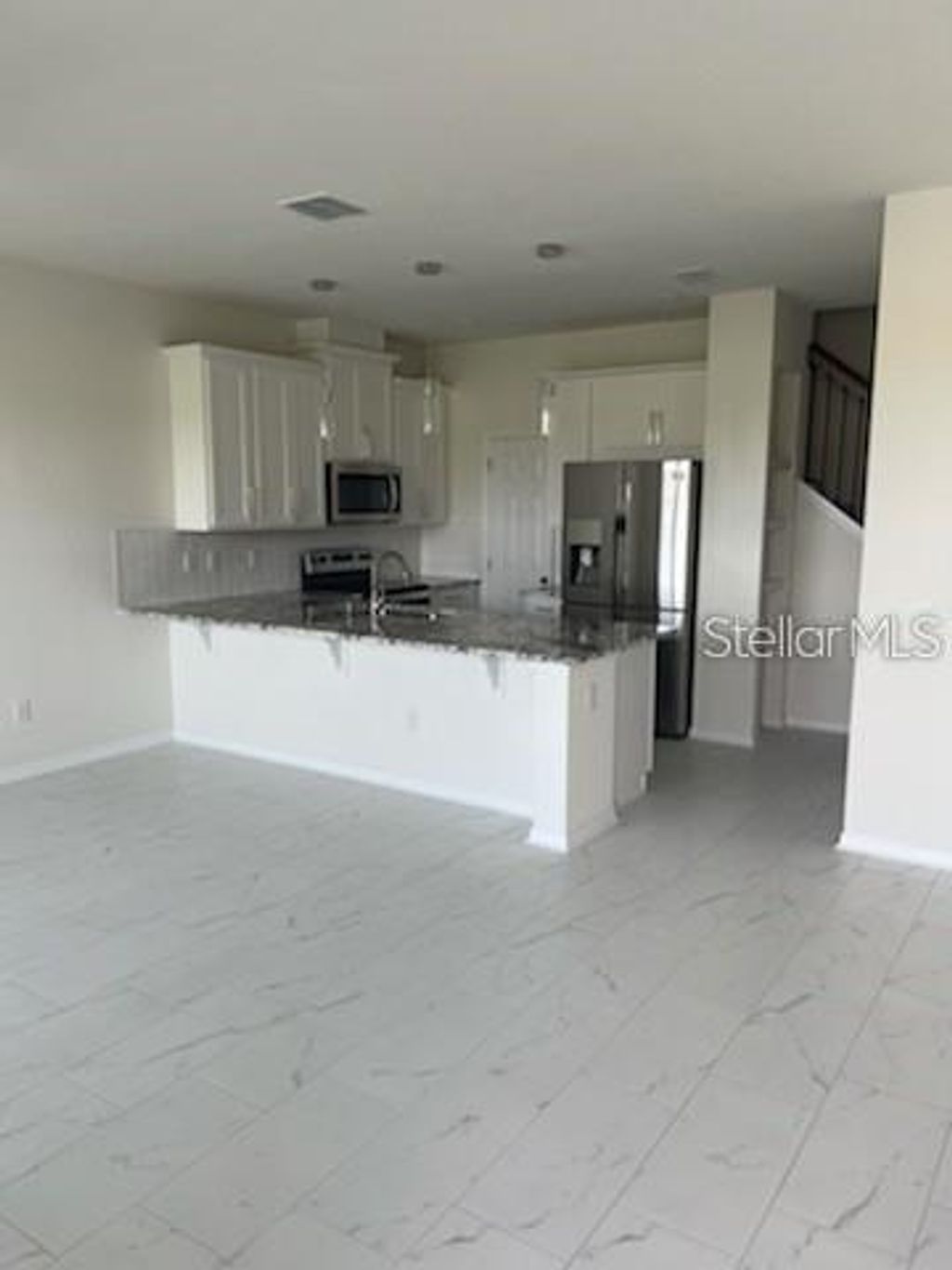 Photo of 2973 Angelonia Thorn Way, Clermont, FL 34711 (MLS # O6363395)