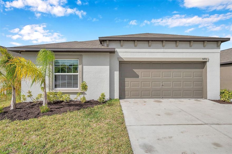 Short Sale. Introducing 5493 Blue Azure Drive, a stunning residence nestled in the sought-after Berry Bay neighborhood of Wimauma, FL. This nearly new 4-bedroom, 2-bath home, constructed in 2022, offers 1,817 sq. ft. of well-designed living space. The open-concept layout maximizes both comfort and practicality, while the kitchen boasts sleek granite countertops, modern stainless steel appliances, and plenty of storage for all your culinary needs. The home’s thoughtful design is highlighted by stylish accent walls, creating an inviting atmosphere throughout. Step outside to a fully fenced backyard, perfect for privacy and outdoor entertaining. As part of the Berry Bay community, you'll have access to a variety of amenities, including a sparkling swimming pool, a clubhouse, playgrounds, a dog park, and sports courts. Ideally situated near I-75 and US-301, you'll have quick and easy access to Tampa, Sarasota, and St. Petersburg. Shopping, dining, and outdoor activities, such as those at Little Manatee River State Park, are all within a short drive. Schedule your showing today!