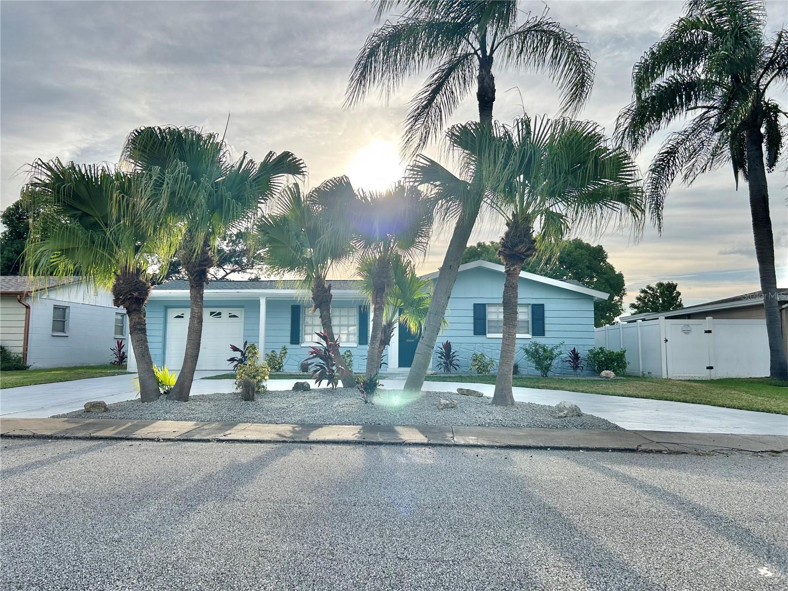 BEAUTIFUL 3/2 POOL home . Relax and enjoy the sunset from your backyard pool oasis that is on a freshwater canal. This home is not in a flood zone. Enjoy fishing off your own dock in the backyard. The large pool has been freshly resurfaced to last for many more years. Enjoy the chefs kitchen that includes white shaker cabinets, premium Quartz counter tops, stainless steel appliances, breakfast bar, led recessed lights, crown molding, and tile backsplash. The two bathrooms have been updated with marble vanity tops, new vanities, and porcelain tile. New ceiling fans & light fixtures thru-out. Natural wood luxury vinyl plank flooring throughout the entire living space. New Window Treatments, New 5 1/2" Baseboards, freshly painted interior and exterior. Brand new ac and pool pump. New landscaping in front with beautiful palm trees. Minutes to gulf beaches, the Anclote fishing pier and historic Tarpon Springs. Tampa airport and the Suncoast Parkway are a short drive from this home, also. Very centrally located. DON’T MISS OUT ON THIS POOL HOME. IT WILL NOT LAST LONG.