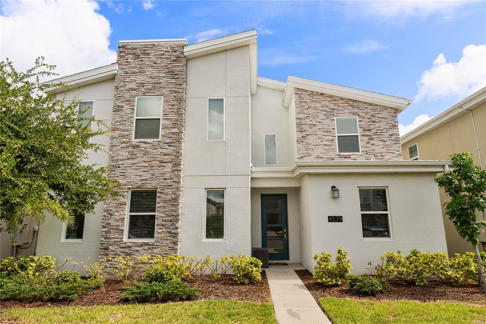 **THIS is the deal of a century! ** PRICED TO SELL ** Welcome to this spectacular resort-style pool home located in the Storey Lake Resort—one of Orlando's most coveted vacation rental communities, FOUR miles from Walt Disney World and all the major Orlando attractions! Whether you’re seeking the ultimate short-term rental investment for Airbnb or VRBO, a magical second home, or a spacious primary residence, this home checks every box. Step inside to discover an entertainer’s paradise featuring a loft-style game room upstairs, a private movie theater, and expansive custom-designed living spaces. With 9 generously sized bedrooms, there’s room for the whole family and then some! Built in 2020, this 2-story TURNKEY, FULLY-FURNISHED property is in pristine condition, with all key elements—roof, HVAC system, and water heater—practically brand new. This home is nestled in a prestigious gated community offering 24/7 security and an impressive lineup of resort-style amenities, including a water park with a lazy river, multiple sparkling pools with thrilling water slides, a fitness center, clubhouse, arcade, playgrounds, tiki bar, basketball/volleyball/tennis courts and more. Don’t miss this rare opportunity to own a home that offers flexibility, luxury, and unbeatable proximity to Disney, Universal, and Orlando’s world-class dining, shopping, and entertainment. Whether you’re investing and want immediate income, vacationing, or planting roots—this is the one.