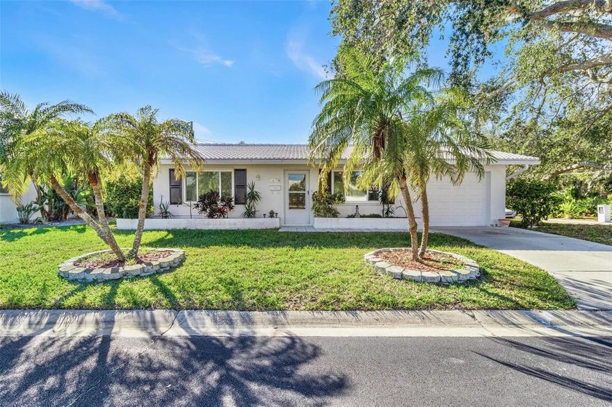 Completely renovated and truly move-in ready, this beautifully updated home offers worry-free coastal living in a highly desirable 55+ community. Every major component and interior finish has been thoughtfully improved, allowing the next owner to move in and enjoy without a to-do list.

A barrel tile roof installed in November 2024 provides long-term durability, while newer windows, hurricane shutters (2023), and a newer A/C system (2022) enhance comfort and efficiency.

The kitchen has been enhanced with the removal of the original pantry closet, replaced with custom pantry cabinetry that maximizes storage and functionality, along with the addition of a dishwasher. Sleek gray cabinetry, granite countertops, and a Samsung appliance package complete the space, creating a clean, modern focal point for everyday living.

Ceramic tile flooring runs throughout the home, delivering a seamless and low-maintenance finish. The primary bathroom offers a spa-like feel, highlighted by an updated shower with a frameless glass enclosure and contemporary finishes.

The garage has also been refreshed — recently cleared and upgraded with a durable epoxy-coated floor.

Ideally situated approximately 2 miles from the Gulf beaches and about 1 mile from the Publix shopping center on Oakhurst Road, the location provides convenient access to shopping, dining, and coastal recreation.

Residents enjoy a maintenance-free lifestyle with HOA-covered exterior maintenance, landscaping, and common area upkeep, as well as access to a community pool and fitness center.

Fully updated, meticulously maintained, and ready for its next owner — this home delivers comfort, style, and peace of mind from day one.