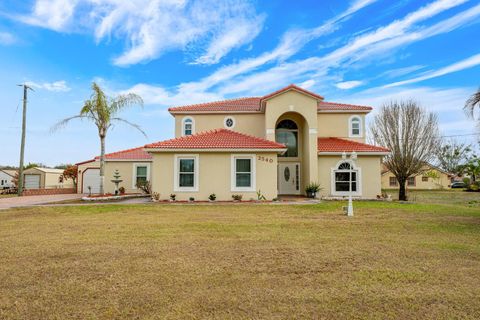 Photo of 2540 Winners Circle, Kissimmee, FL 34744 (MLS # O6382446)
