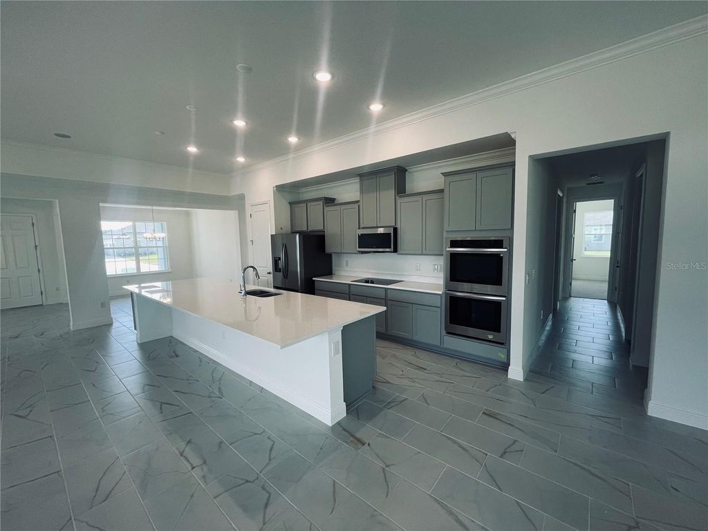 Photo of 10182 White Magnolia Square, Thonotosassa, FL 33592 (MLS # O6358404)