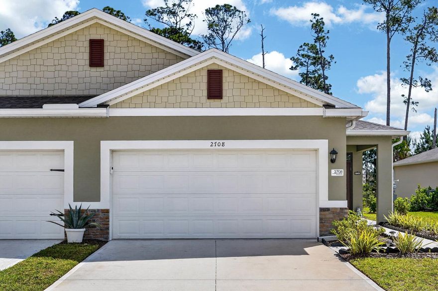 Why wait months for new construction when you can move right into a villa that already has the upgrades buyers actually want? Recently built and meticulously maintained, this nearly new Halifax Plantation villa offers the perfect blend of low-maintenance living and designer touches already in place. This 2-bedroom, 2-bath villa with a 2-car garage features an open-concept layout designed for both comfortable everyday living and easy entertaining. The spacious kitchen featuring quartz countertops and island, tile backsplash and stainless-steel appliances overlook the main living and dining areas, while the split-bedroom floor plan provides privacy for guests and owners alike. Unlike waiting on a builder timeline, this home is truly move-in ready with thoughtful upgrades already completed, including a designer accent wall, updated interior paint, screened back porch, epoxy garage floors, and custom storage added to both the primary bedroom closets and garage. Every detail has been carefully selected to enhance both style and functionality. Whether you're looking for a full-time residence, seasonal getaway, or an easy downsizing option, this home offers the feel of new construction without the wait, added expense, or unfinished projects that often come with buying brand new. Halifax Plantation Golf Community is home to a Championship Golf Course which residents are able to enjoy, along with other amenities, with an optional membership. This community is conveniently located to shopping, dining, hospitals and all that sunny Ormond Beach, FL has to offer. Schedule a showing today! The low HOA dues cover landscaping allowing you to fully relax and just enjoy the neighborhood. All information taken from the tax record, and while deemed reliable, cannot be guaranteed.
