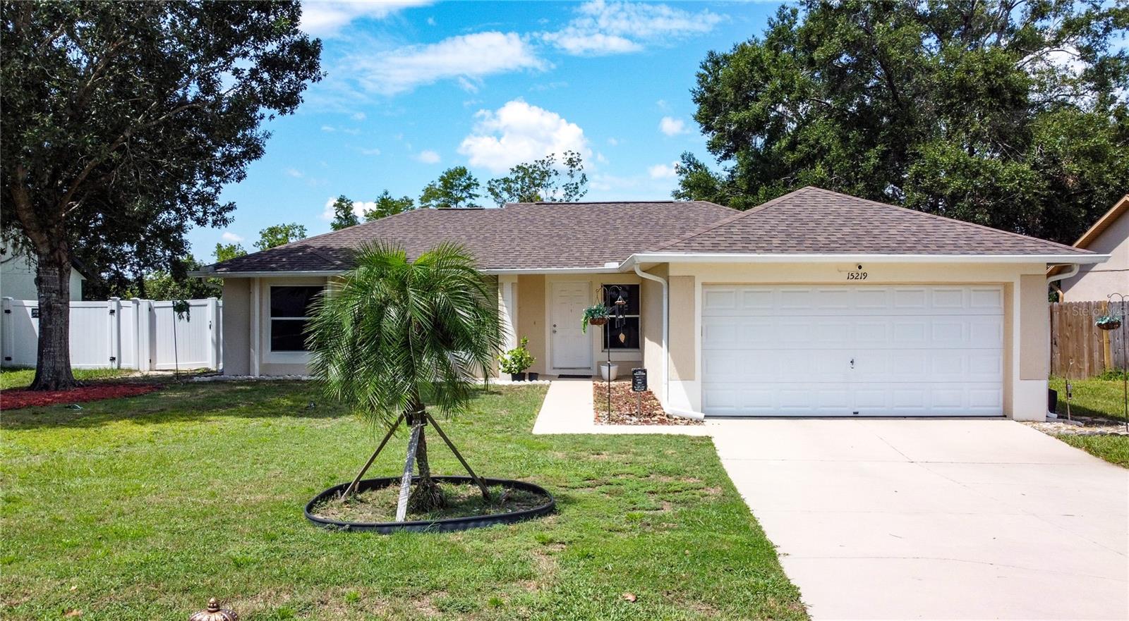 Discover this beautifully maintained 3 bedroom, 2 bathroom single-family home offering 1,264 square feet of stylish living space in a peaceful suburban neighborhood. Designed with comfort and convenience in mind, the home features tile flooring throughout, a spacious 2-car garage, and recent updates including a newer roof and AC unit. Enjoy the privacy of a fenced backyard with no rear neighbors, where the property backs to serene wetland conservation, creating a natural retreat right at home. Perfectly situated just 1 mile from supermarkets, shopping, and dining, and less than 10 miles from world-famous theme parks, this residence combines everyday ease with exceptional lifestyle appeal. Priced right for first-time buyers or investors, this home offers both value and opportunity in a highly desirable location.