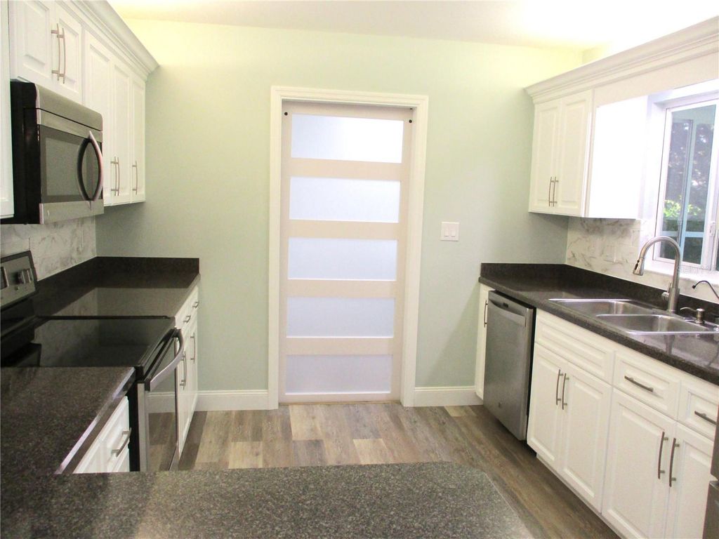 Photo of 11298 SW 138th Lane, Dunnellon, FL 34432 (MLS # OM705287)