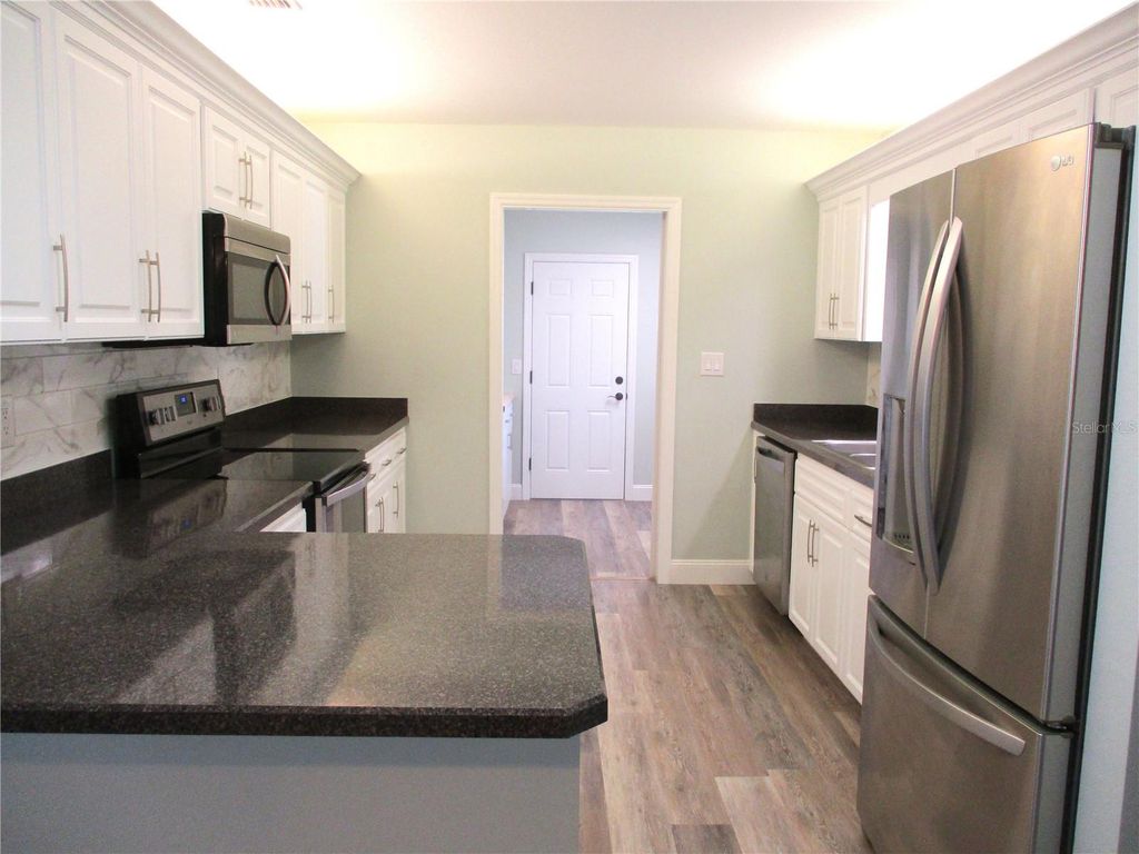 Photo of 11298 SW 138th Lane, Dunnellon, FL 34432 (MLS # OM705287)