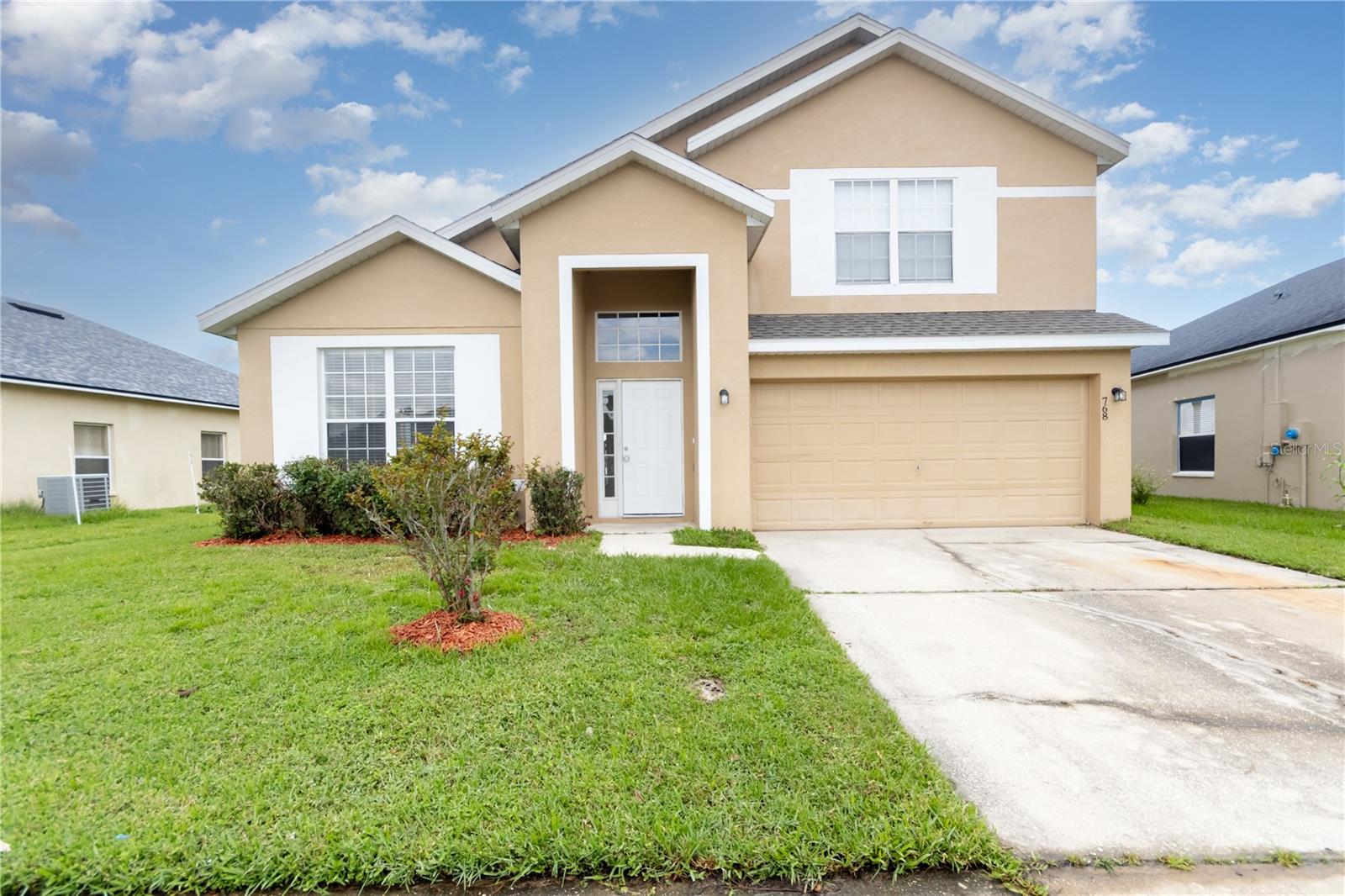 Spacious five-bedroom, two-and-a-half-bathroom home with a waterfront view in a gated community—ready for its next owner. Larger than most homes in the subdivision, this property features a primary suite on the main floor with a generous walk-in closet, dual vanities, and a separate tub and shower. Upstairs, you’ll find the remaining bedrooms along with a shared hallway bathroom. The large backyard offers stunning lake views, ideal for entertaining or relaxing outdoors. Conveniently located near shopping, dining, and local attractions. Don’t miss this opportunity—schedule your showing today!