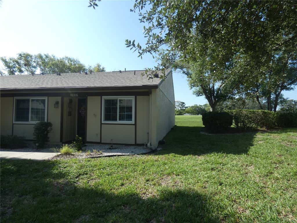 Photo of 11231 Dollar Lake Drive #6, Port Richey, FL 34668 (MLS # W7888251)
