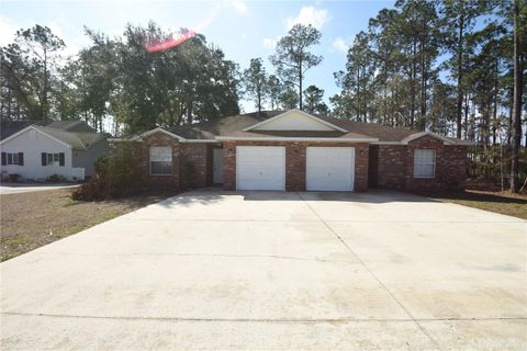 Photo of 35 Brunswick Lane #A & B, Palm Coast, FL 32137 (MLS # FC316313)