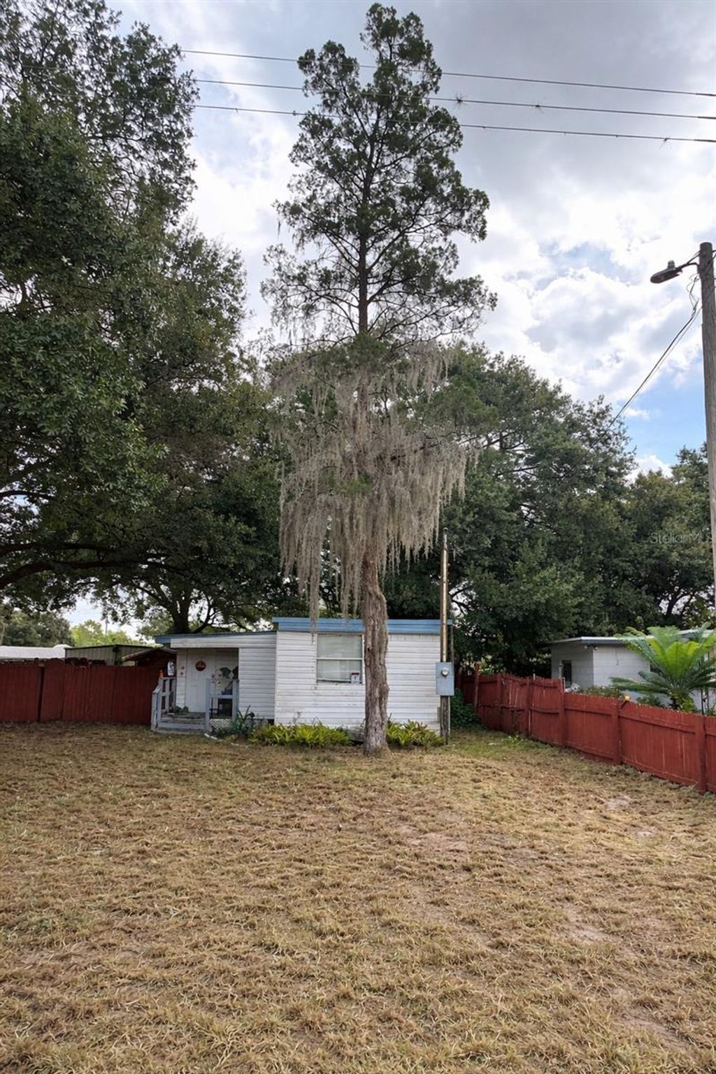 Photo of 835 27th Street NW, Winter Haven, FL 33881 (MLS # O6394996)