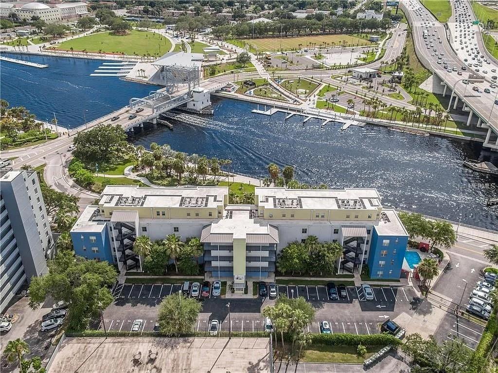 Welcome to 1501 Doyle Carlton Dr, Apt 411, a stunning furnished riverfront loft in the heart of Downtown Tampa! Nestled in a boutique condo building steps from the Tampa Riverwalk, this vibrant and airy residence offers the perfect blend of style, comfort, and city-living convenience.
Interior Features:
2 Bedrooms + Loft | 2 Custom Bathrooms
Soaring vaulted ceilings with exposed brick feature wall
Stylish open kitchen with granite countertops, stainless steel appliances, pantry & breakfast bar
Hardwood & ceramic tile floors throughout.
Modern staircase with black iron railings
Designer light fixtures, artistic tilework, and custom finishes throughout
Private balcony with peaceful tree-lined views
Spacious walk-in closet and dedicated in-unit laundry
Building & Community:
Gated entry & secure access
Riverside pool & sun deck with stunning water views
Elevator access
2 off-street parking spaces included
Water & trash included
Pet-Friendly! Dogs and cats welcome
Smoke-free home
Fully furnished – just bring your suitcase!
Location Perks:
Walk or bike to Water Works Park, Armature Works, University of Tampa, Tampa Riverwalk, and downtown restaurants and nightlife. Easy access to I-275 and all major transit routes.
This one-of-a-kind loft won't last long – message today to schedule a tour or reserve your place in Tampa's most vibrant neighborhood.