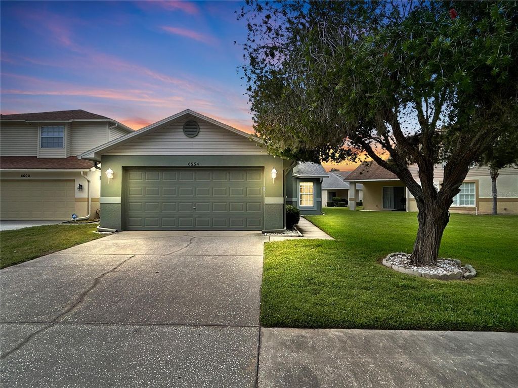 Photo of 6554 Gentle Ben Circle, Wesley Chapel, FL 33544 (MLS # OM710964)