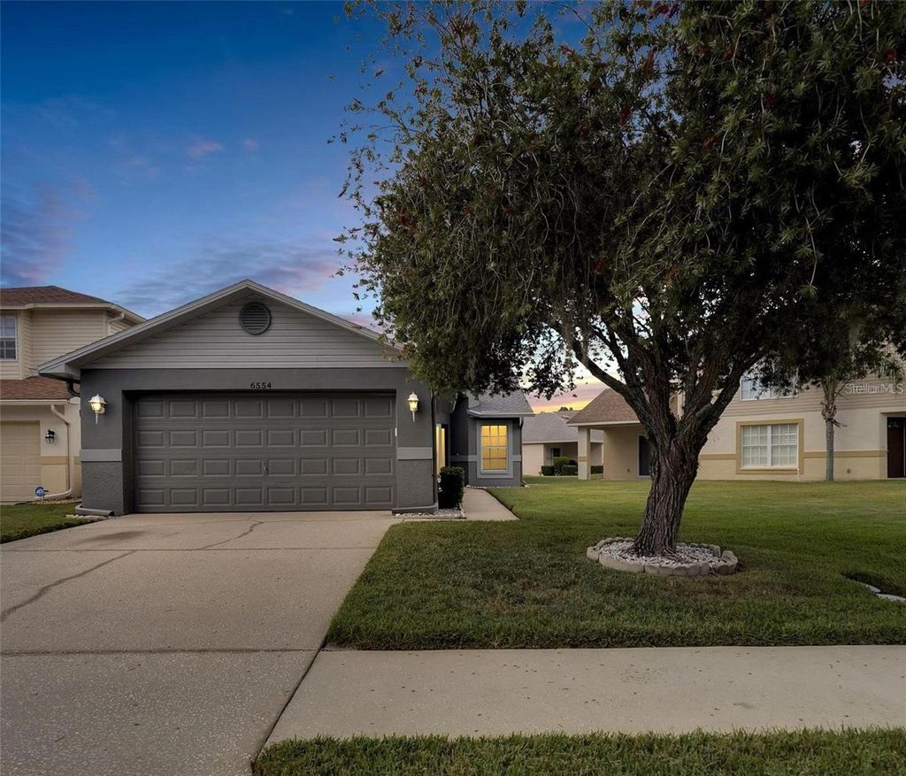 Photo of 6554 Gentle Ben Circle, Wesley Chapel, FL 33544 (MLS # OM710964)