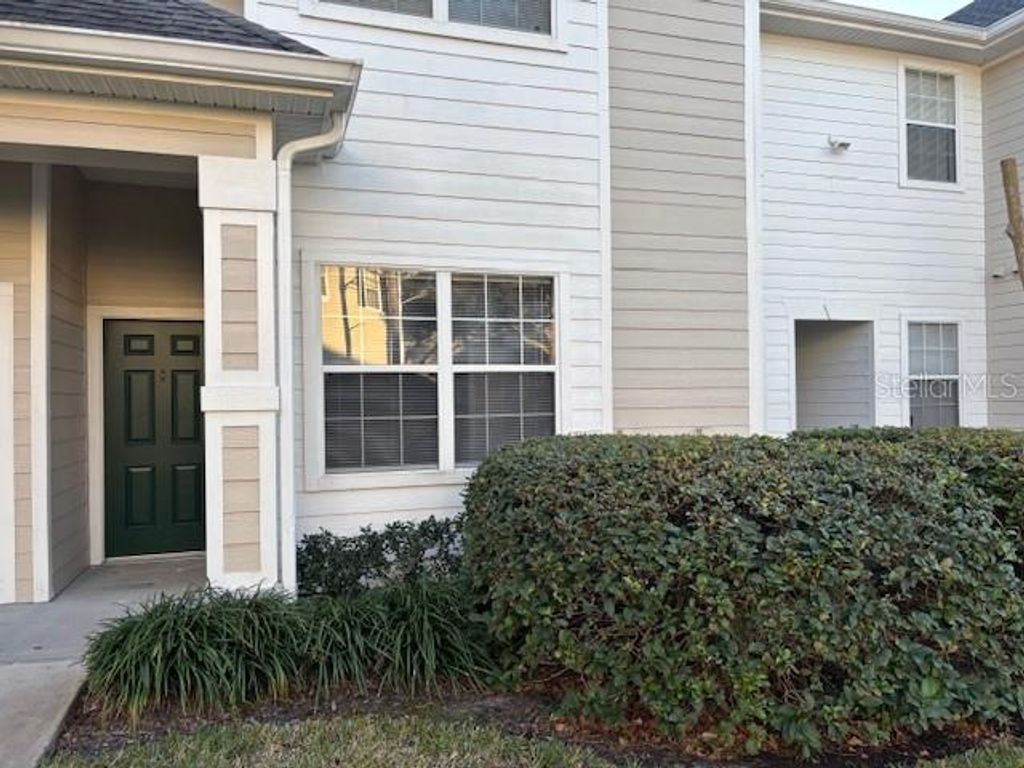 Photo of 303 Southern Pecan Circle #107, Winter Garden, FL 34787 (MLS # S5143459)