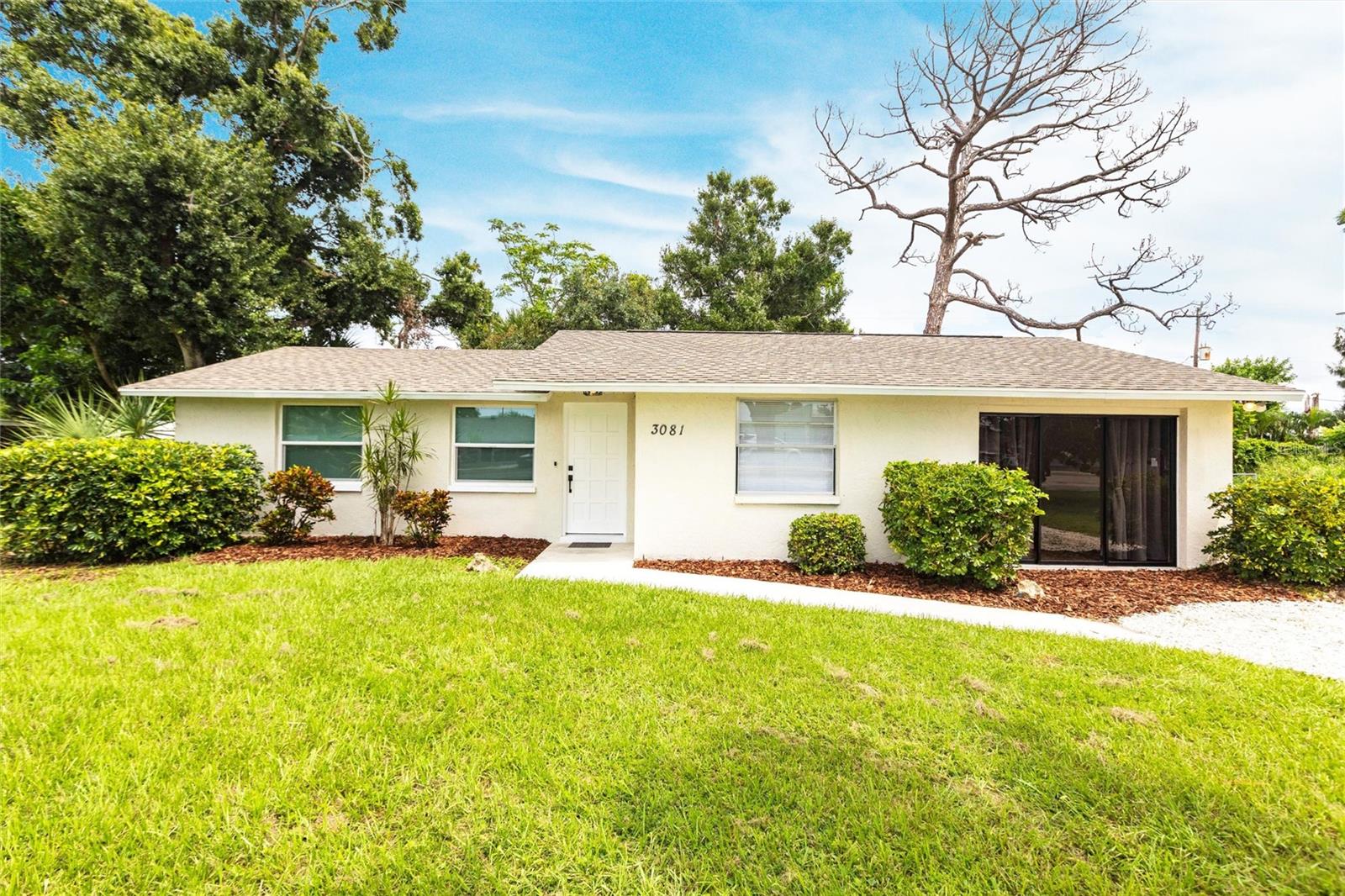 One or more photo(s) has been virtually staged. Seller is offering $3,500 toward buyer’s closing costs, making this home even more attractive!
Welcome to this charming and fully renovated Venice home, located in an established neighborhood with mature landscaping and a fenced-in backyard. The converted garage has been thoughtfully transformed into a bonus room with its own private entrance and central AC, offering endless possibilities: guest suite, home office, studio, or playroom. A convenient laundry closet with bifold doors adds to the functionality of the space.
The interior boasts a modern and inviting design with a spacious living and dining area perfect for family gatherings. The kitchen is beautiful and elegant, featuring all-new appliances and a stylish, functional layout that makes cooking a pleasure. The large master bedroom features a walk-in closet and a private bathroom, while the secondary bedroom is generous in size with a built-in closet. Both bathrooms are modern and elegantly designed, with a tasteful, understated style that adds a sophisticated touch to the home.
Enjoy the comfortable covered lanai with a newly installed screen, perfect for relaxing, entertaining, or hosting a barbecue in the spacious backyard. The home also features brand-new flooring and cozy, welcoming interiors throughout.
Great location with quick access to shopping, dining, and just minutes from Venice’s award-winning beaches and the island. A welcoming neighborhood, modern updates, versatile spaces, and a backyard perfect for enjoying Florida’s pleasant climate make this home ideal for families and entertaining.
Walkthrough video available here: https://youtube.com/shorts/8byPd9Eb-ZY?si=k9fbDYMrZ0B73sfs