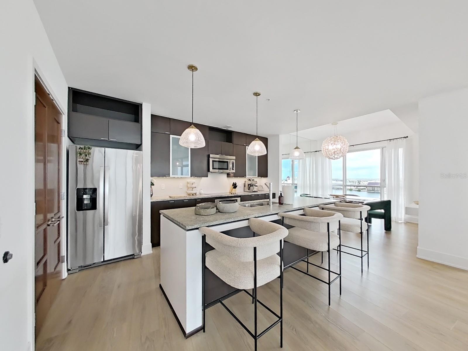 THE PLACE AT CHANNELSIDE A CON - Residential