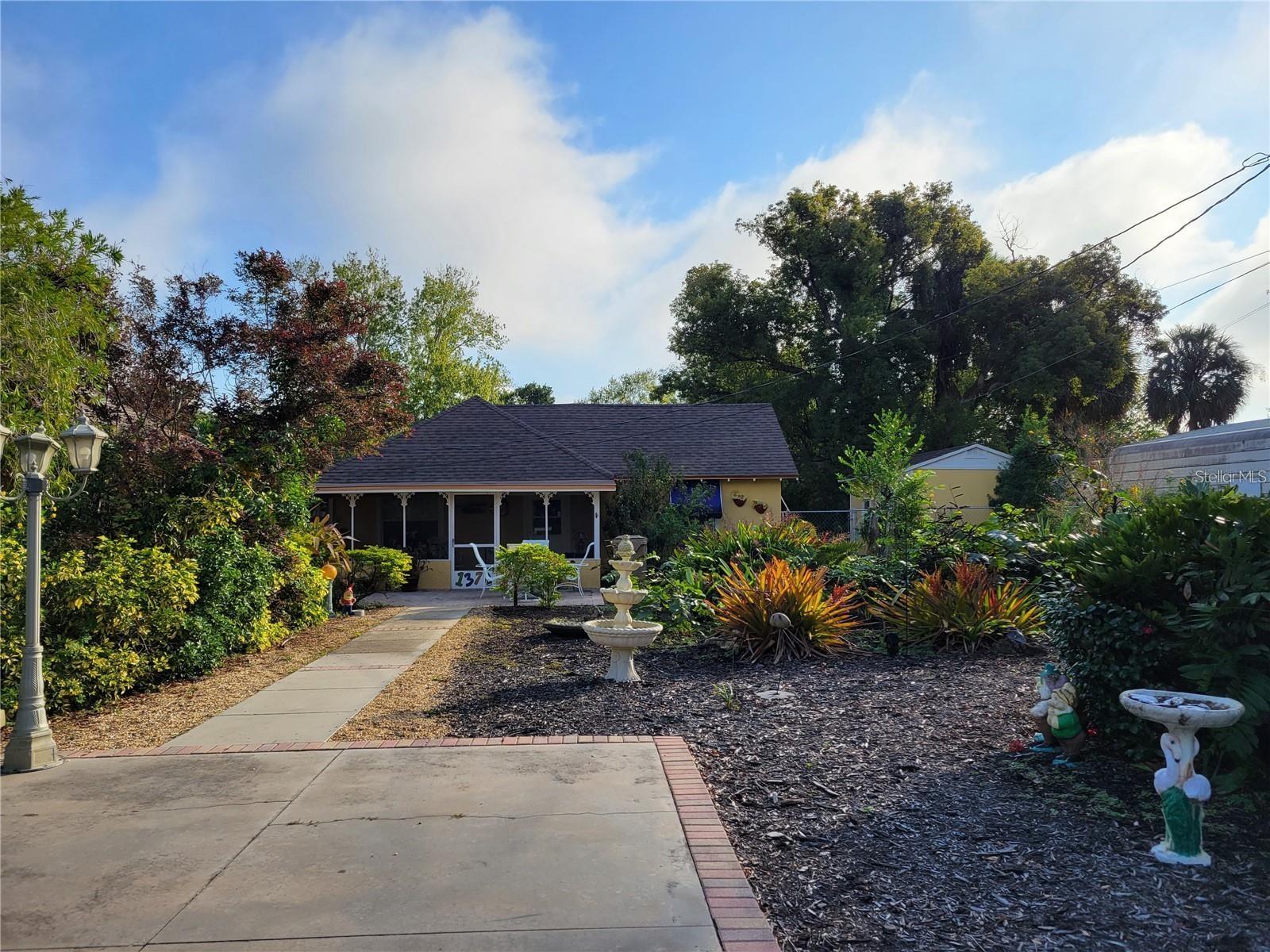 Casa Dora Bungalow. Come stay at this amazing cottage Bungalow as Mount Dora, FL. Casa Dora Bungalow is a 2 Bedroom/1 Bath Bungalow that sleeps up to 4 with lots of Vintage charm! Enjoy the quaint living room, dining room, kitchen, outdoor dining out your front or back door. Everything you need is here, just bring yourself, food and your personal items. Minimum 3-month rental or longer. Separate laundry facility to do your wash while you sit by the pond or take a nice relaxing hot tub dip. Take in the beauty and enjoy the private garden with a waterfall/pond and feed the goldfish. Enjoy the firepit or sit and have cocktails by the pond. Just minutes to Downtown Mount Dora’s historic district and great restaurants and adorable shops. You are also about 45 minutes to Orlando and all the theme parks. Do not miss out on this experience, you won't ever want to leave. All utilities are included as well as Lawn Maintenance. Any Leases under 6 months and a day will have to pay sales tax on top of the rent. We are a non-smoker only lodging and no pets.
