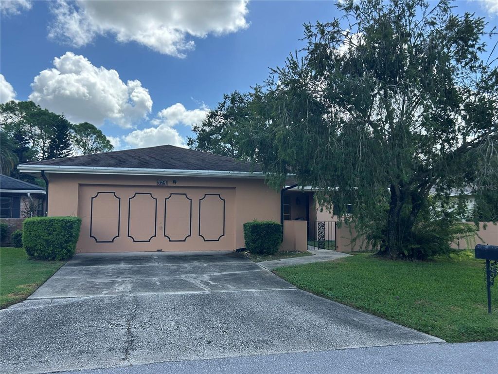 Photo of 374 Troon Court, Winter Haven, FL 33884 (MLS # P4936606)
