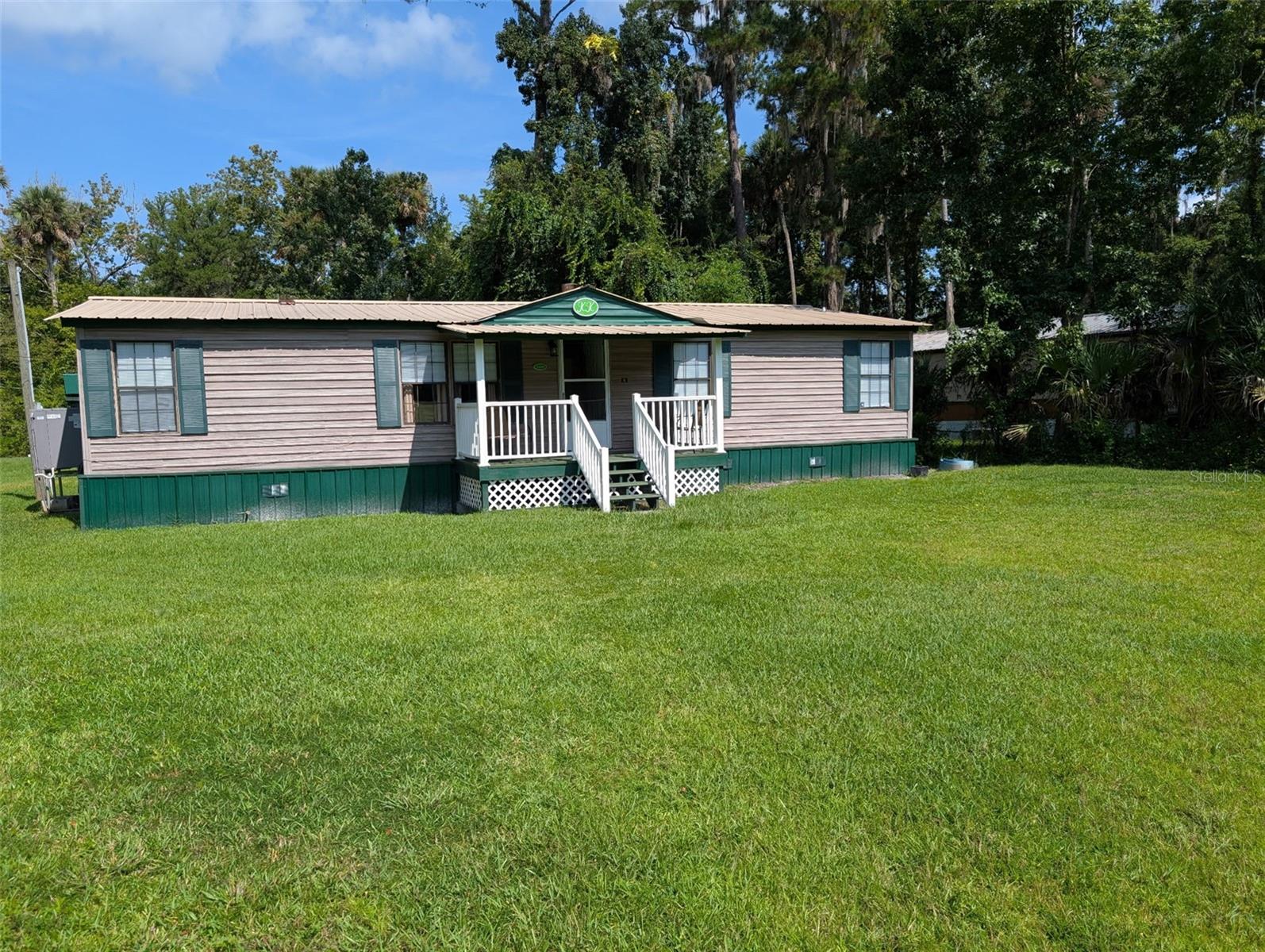 Nestled on a corner lot surrounded by trees, this fully furnished home offers peace, privacy and comfort. Covered front porch to sit and drink a coffee in the morning hours while watching and listening to the near by wild life. Inside is a fully furnished including linens 3 bedroom 2 full bathrooms. Included in the rent lawn service, garbage pick-up and a monthly cleaning service.
For $40.00 a year tenants may enjoy access to a private boat ramp off Blue Creek Road.
No pets permitted.