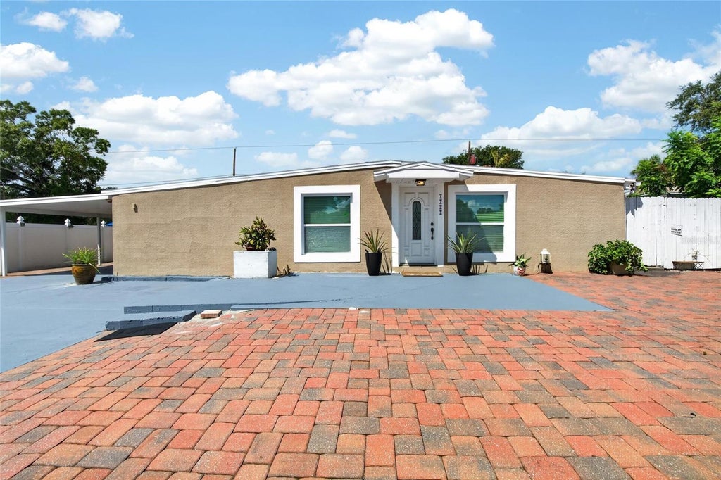 Photo of 1727 Waikiki Way, Tampa, FL 33619 (MLS # TB8547700)