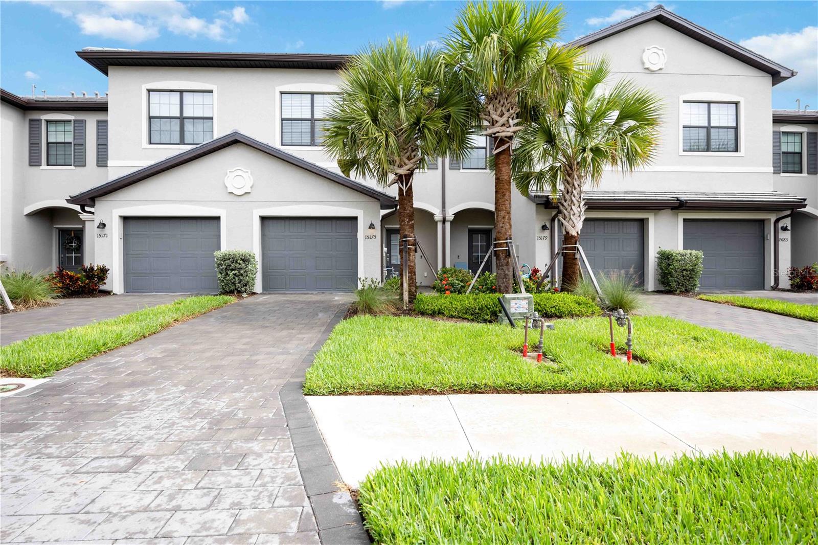 One or more photo(s) has been virtually staged. !!PRICED TO SELL!! HUGE PRICE IMPROVEMENT ...Welcome home! GORGEOUS 3 bedroom, 2 1/2 bath luxury townhome in the amazing community of Lorraine Lakes in Lakewood Ranch, offers a stunning view of the lake. With its contemporary design and luxurious features, this townhome provides a comfortable and stylish living experience. As you enter the townhouse, you are greeted by an open-concept living area that seamlessly combines the living room, dining area, and kitchen. Some of the features included are: hurricane protection on sliding glass doors and windows, granite countertops, SS appliances, designer lighting in all bathrooms, tankless water heater, a Ring doorbell for enhanced security and more. Upstairs, you will find the 3 bedrooms, each designed to provide comfort and privacy. The primary room boasts a spacious layout, large windows, and 2 walk in closets. The en-suite bathroom features designer plumbing fixtures and accessories. The other 2 bedrooms are well-appointed and share a stylishly designed bathroom. This townhouse is part of a community that offers amenities such as a resort style pool with lap lanes, tennis, pickleball and basketball courts, splash park, playground, turf putting green, sand volley ball and state of the art fitness center. There are many activities to choose from! Conveniently located near downtown Sarasota, world class dining and shopping, St Pete, A rated school system and our famous gulf beaches! It is the perfect place to call home.