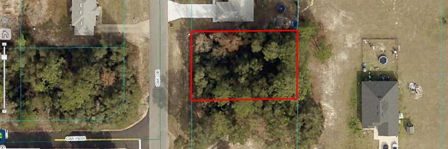 Great Vacant lot to build a single-family home in a growing neighborhood. The lot is on a paved road in Silver Springs Shores. Call for more information! Seller financing is available.