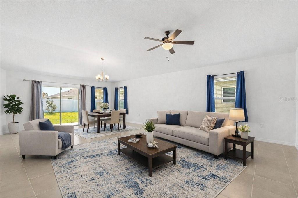 Photo of 1429 Mattie Pointe Lane, Auburndale, FL 33823 (MLS # O6386646)