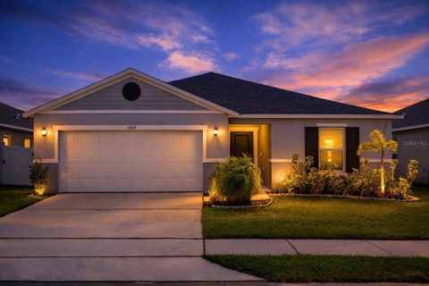 Photo of 1429 Mattie Pointe Lane, Auburndale, FL 33823 (MLS # O6386646)