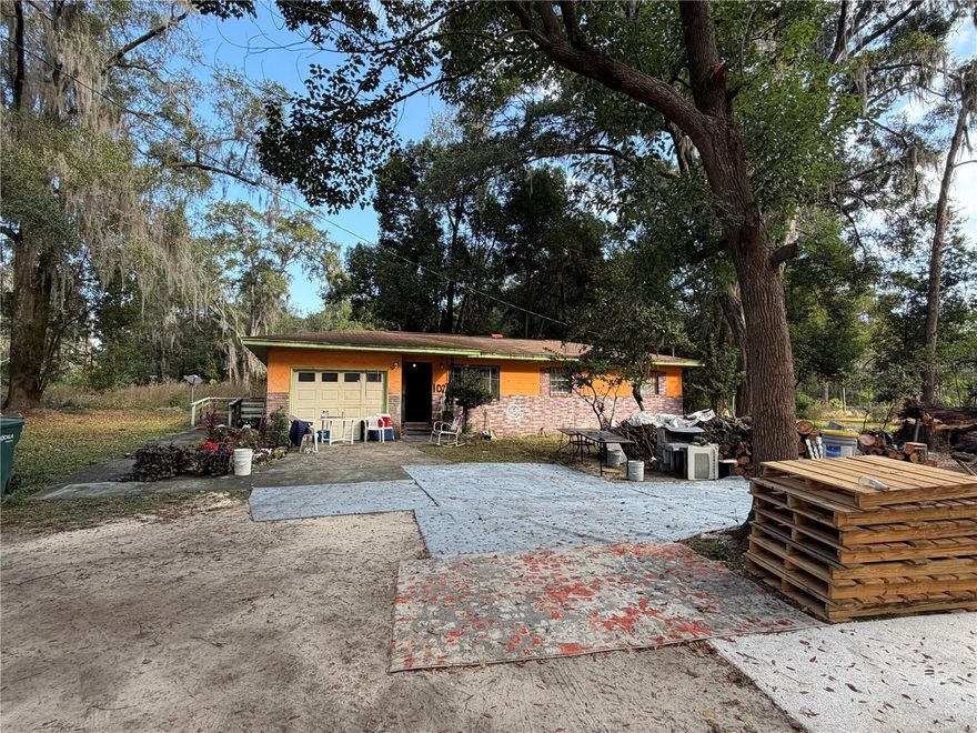 Investor or handyman special, in a wonderful central location in desirable Ocala.. This 3 bedroom, 2 bath home is very privately located. Is currently being rented out, so has the potential for immediate income for a rental property.