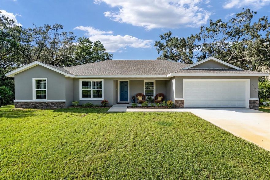 Beautiful, charming waterfront home built in 2023, perfectly positioned on the peaceful shores of Smith Lake, a private, spring-fed oasis ideal for water sports, jet skiing, and outstanding fishing. This thoughtfully designed home includes a versatile fourth bedroom or office/flex space. Enjoy a light and airy interior with neutral tones, luxury vinyl plank flooring throughout, and tile in the bathrooms. The kitchen features a sleek stainless steel appliance package. Step outside to the dock, perfect for taking in the tranquil lake views. Ideally located between Ocala and The Villages, you’ll have convenient access to shopping, dining, and entertainment. Nearby waterfront favorites like Gators Joe’s and Eaton’s Beach are just minutes away. The property also offers a backyard set up for fun and entertaining with a volleyball court, tetherball, and horseshoes. A concrete community boat ramp is located just a few hundred yards away for easy lake access. Whether you’re looking for relaxation or recreation, this private lakefront retreat delivers the best of both. Water softener installed in 2023.